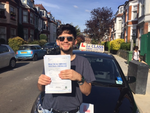 Sam with Driving test pass certificate
